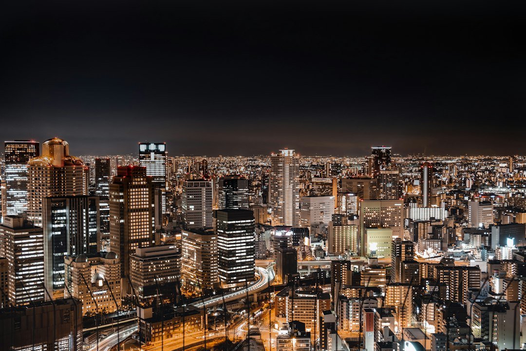Osaka Japan skyline at night representing the Bank of Japan's rate decision and the yen