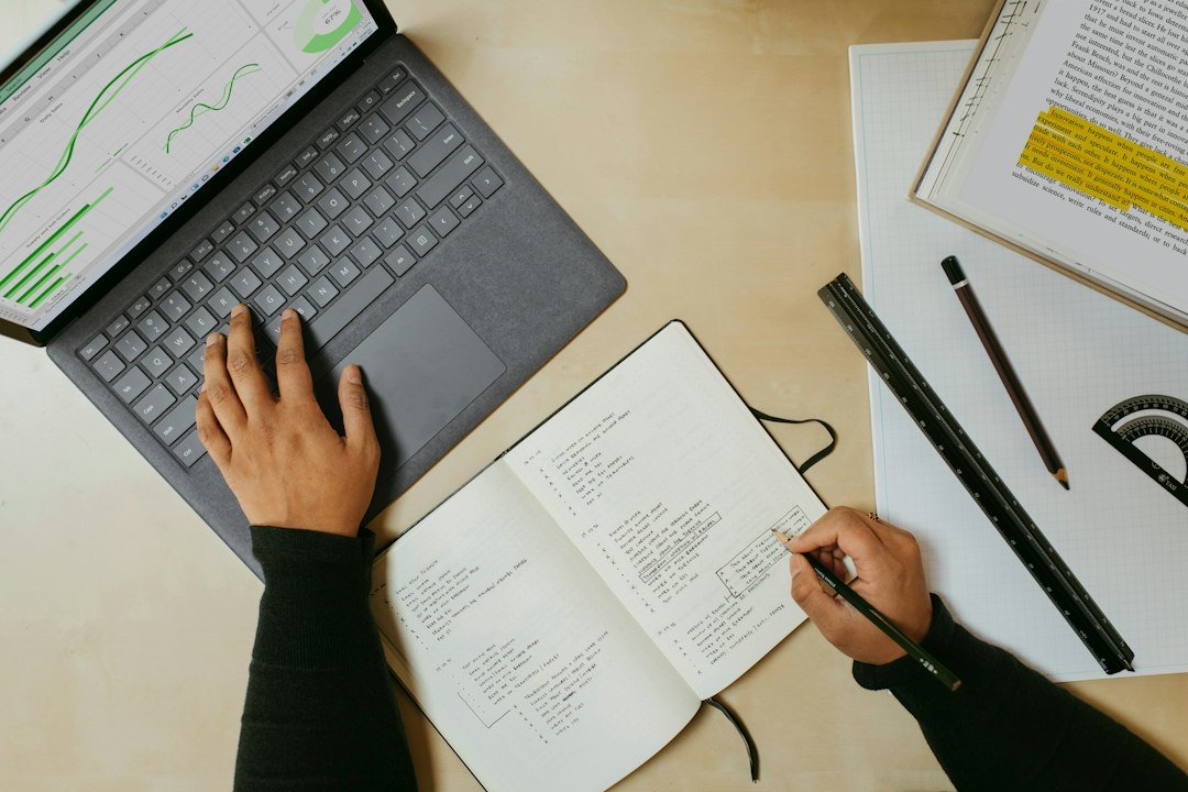 Person studying on a laptop representing forex education and central bank basics